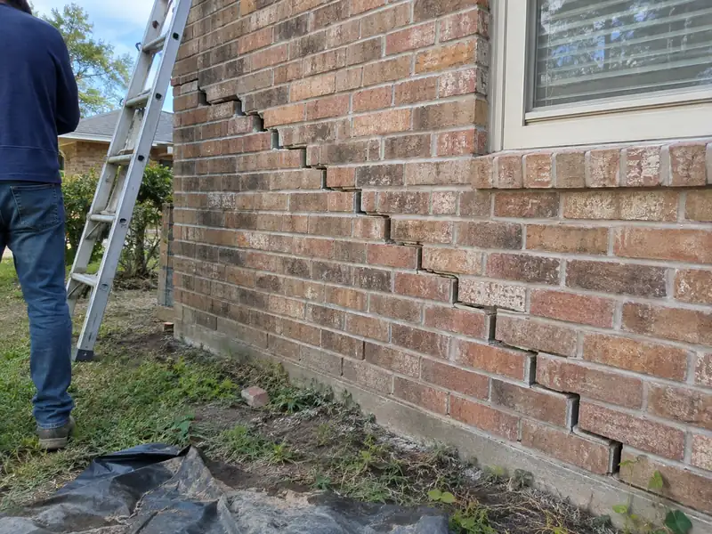 Stair-step crack in brick veneer on a Baton Rouge home